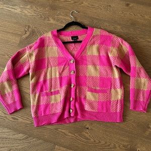 Pink & tan v-neck button up sweater. Can be used as a cardigan as well